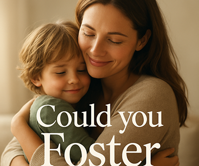 Image of smiling woman cuddling a male child about 5 year of age. captioned "Could you Foster"